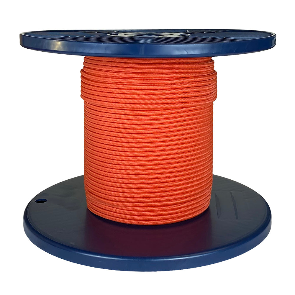 Spool of orange shock cord on a blue plastic reel with a white background