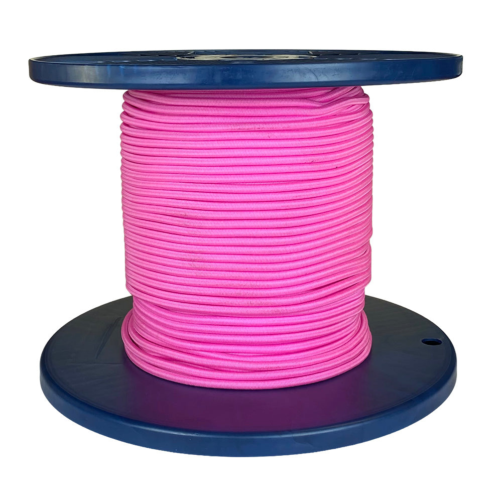Spool of pink shock cord on a blue plastic reel with a white background
