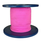 Spool of pink shock cord on a blue plastic reel with a white background
