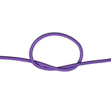 Close-up of purple bungee cord in a knot on a white background