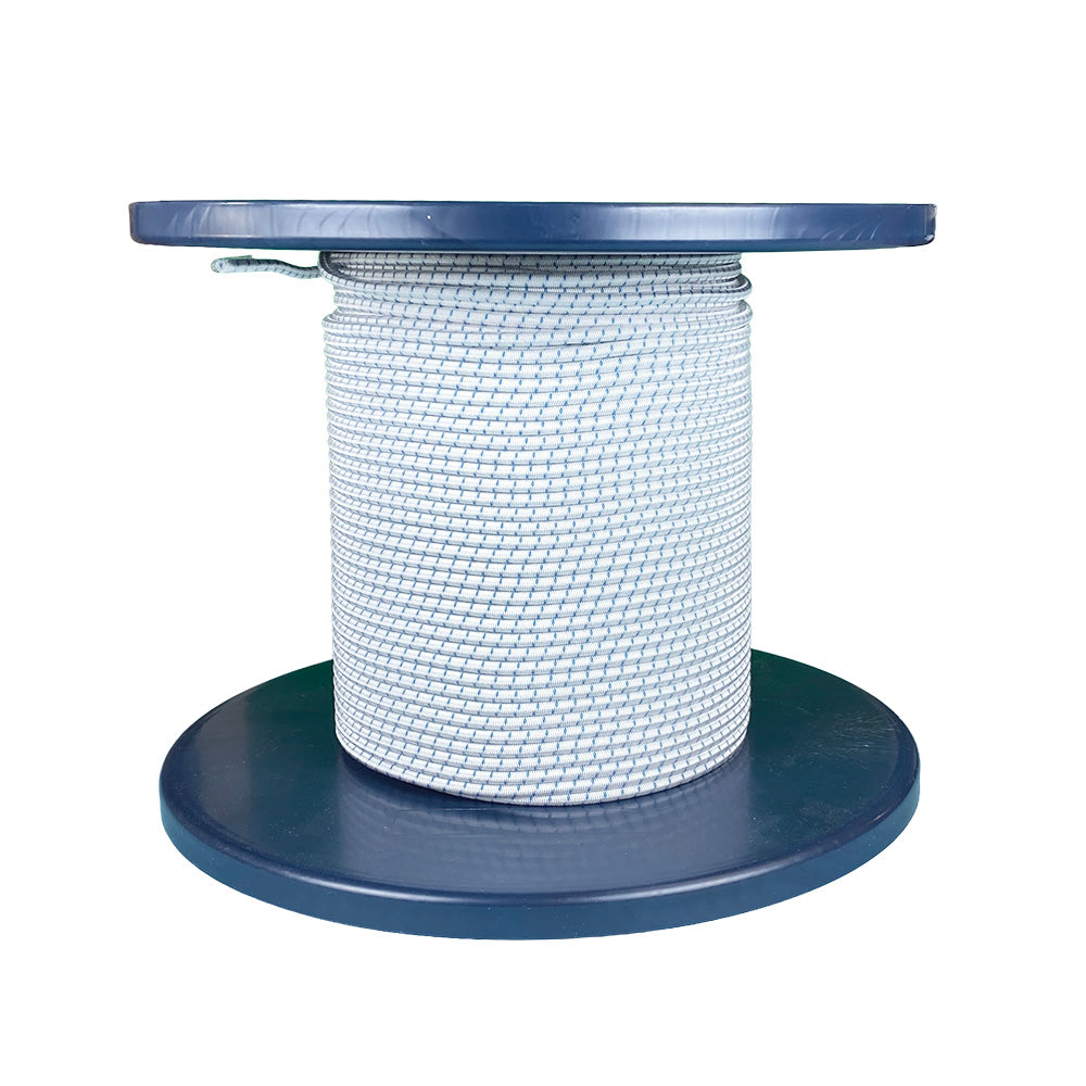 Spool of 3mm white bungee cord with a blue fleck on a blue reel against a white background
