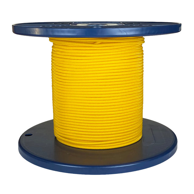 Spool of yellow shock cord on a blue plastic reel with a white background