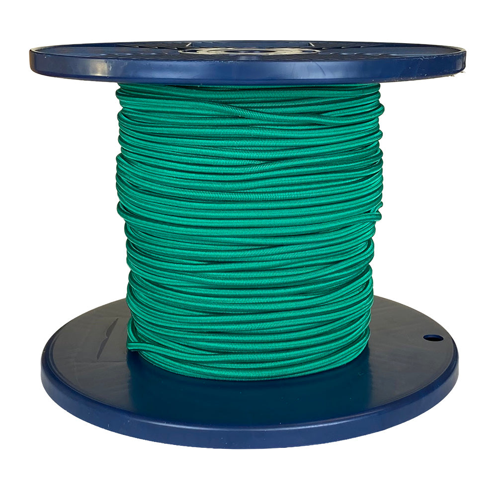 Spool of green shock cord on a blue plastic reel with a white background