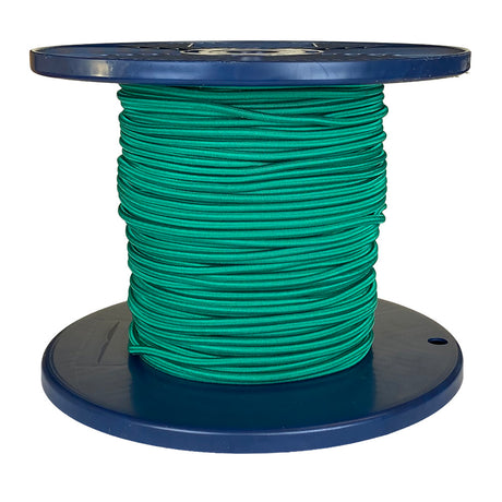 Spool of green shock cord on a blue plastic reel with a white background
