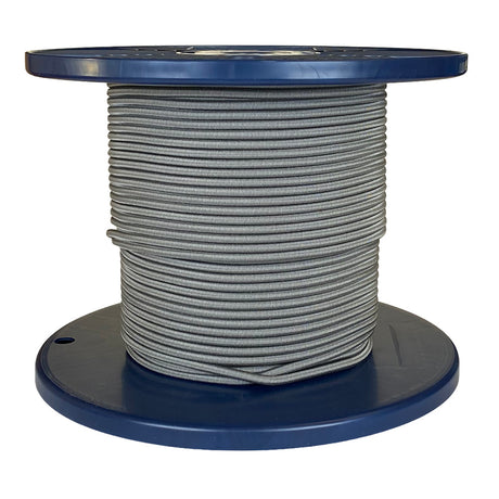 Spool of grey shock cord on a blue plastic reel with a white background