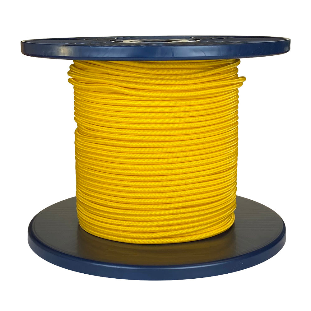 Spool of yellow shock cord on a blue plastic reel with a white background