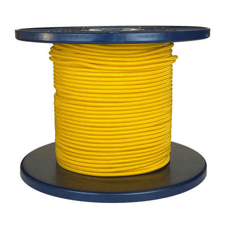 Spool of yellow shock cord on a blue plastic reel with a white background