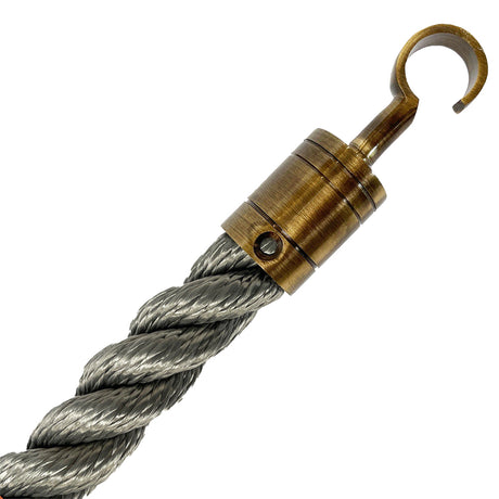 Grey rope with a brass-colored hook on a white background