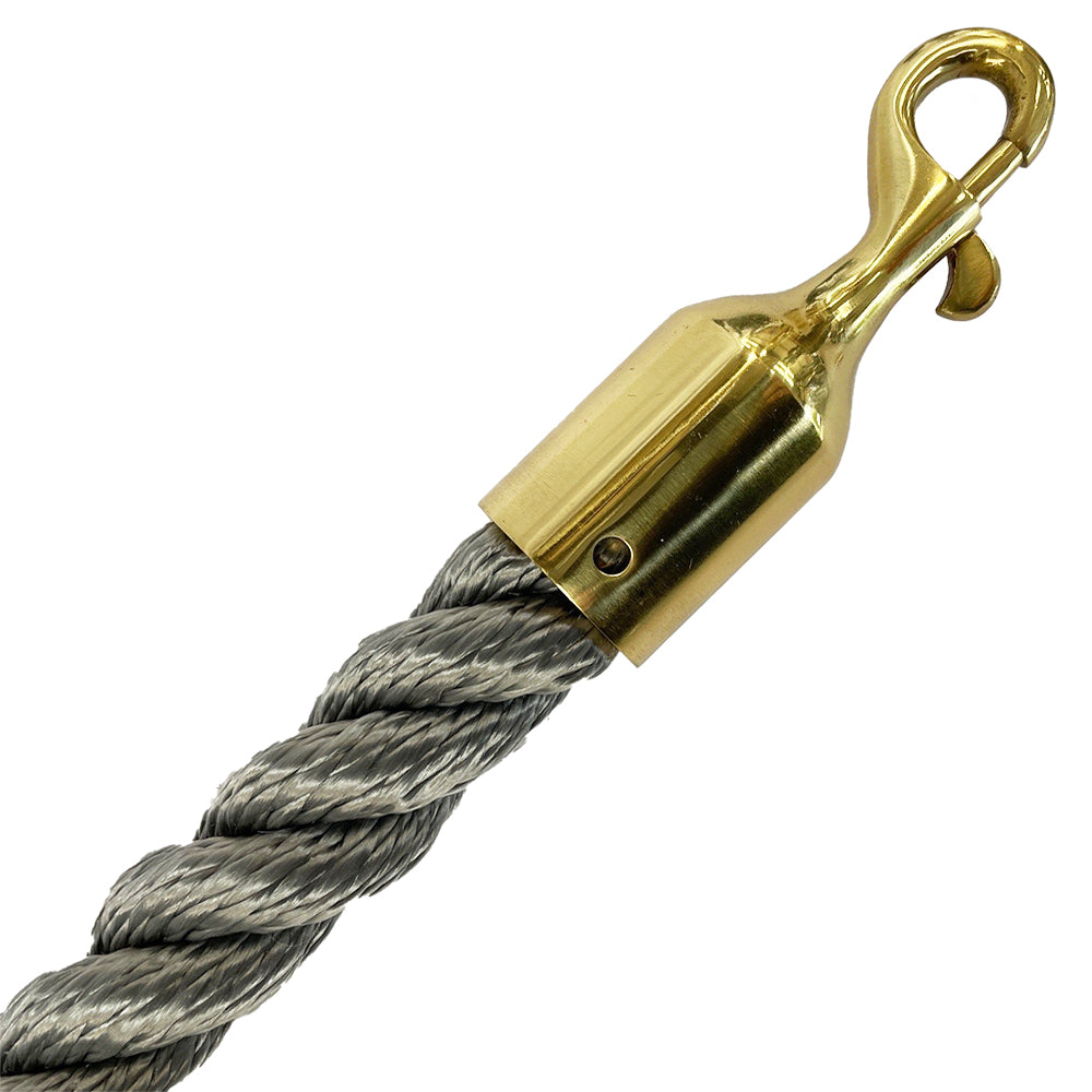 Gold hook attached to a gray rope on a white background