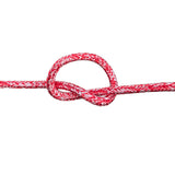 Red and white flecked 6mm braided rope in a knot on a white background