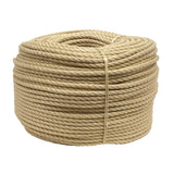 Coil of natural coloured synthetic hemp rope on a white background