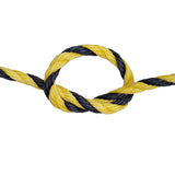 Close-up of a yellow and black rope with a knot on a white background