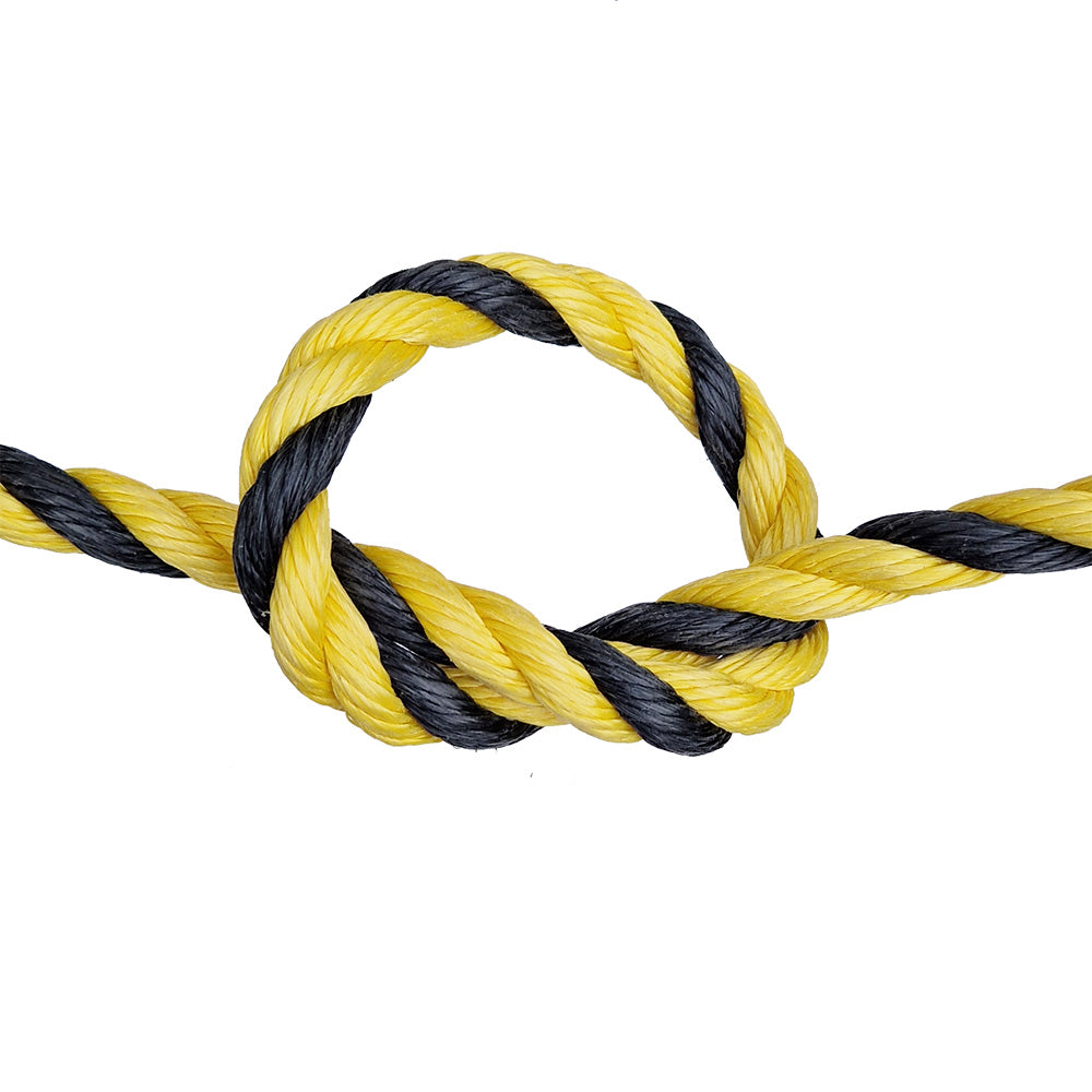 Yellow and black rope tied in a knot on a white background