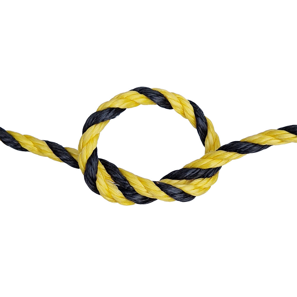 Yellow and black braided rope on a white background