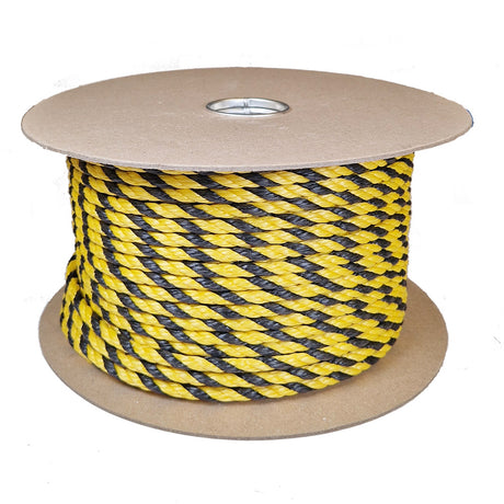 Spool of yellow and black rope on a cardboard reel