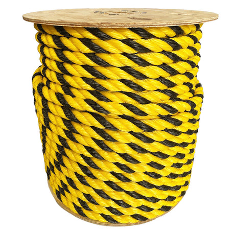Spool of 20mm yellow and black tiger rope on a wooden reel with a white background