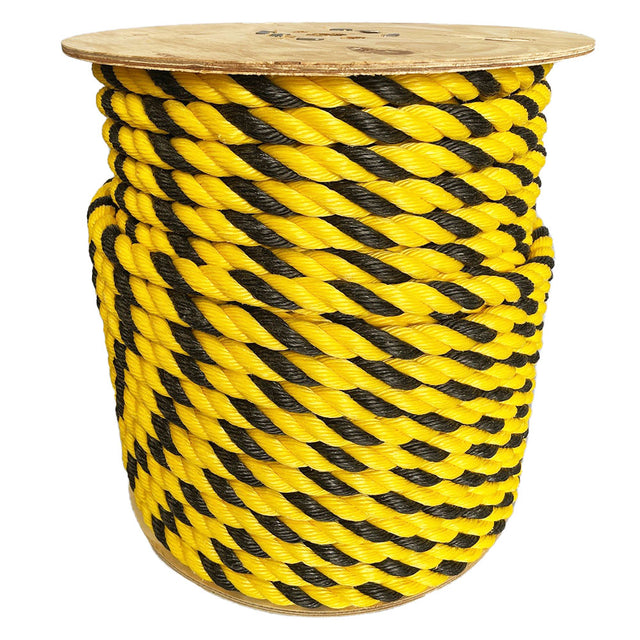 Spool of 20mm yellow and black tiger rope on a wooden reel with a white background