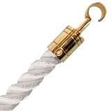 Gold hook attached to white rope on a white background