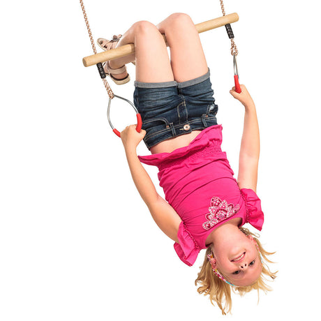 Hardwood trapeze with metal rings on a white background.