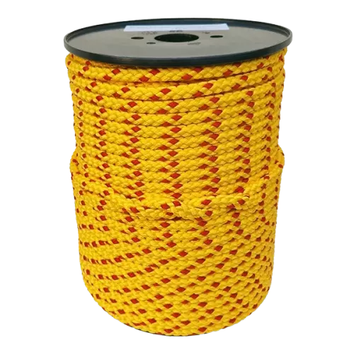 Spool of yellow rope with red accents on a white background