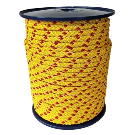 Spool of yellow rope with red accents on a white background