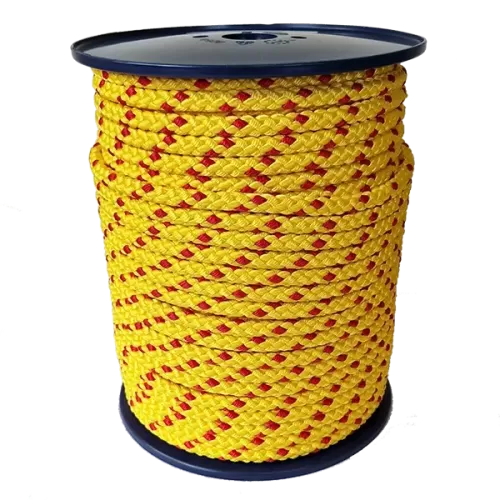 Spool of yellow rope with red accents on a white background