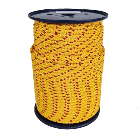 Spool of yellow rope with red accents on a white background